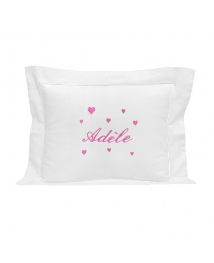 Coussin personnalisé en fuchsia avec des cœurs